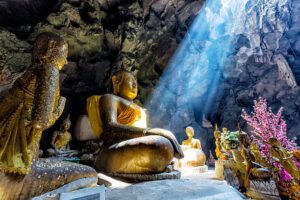 Amazing Buddhism with the ray of light in the cave